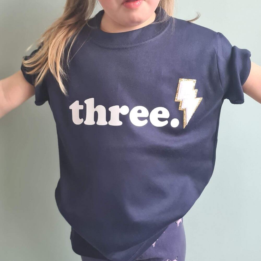 toddler wearing 3rd birthday navy blue tshirt by The Joyful Rebel