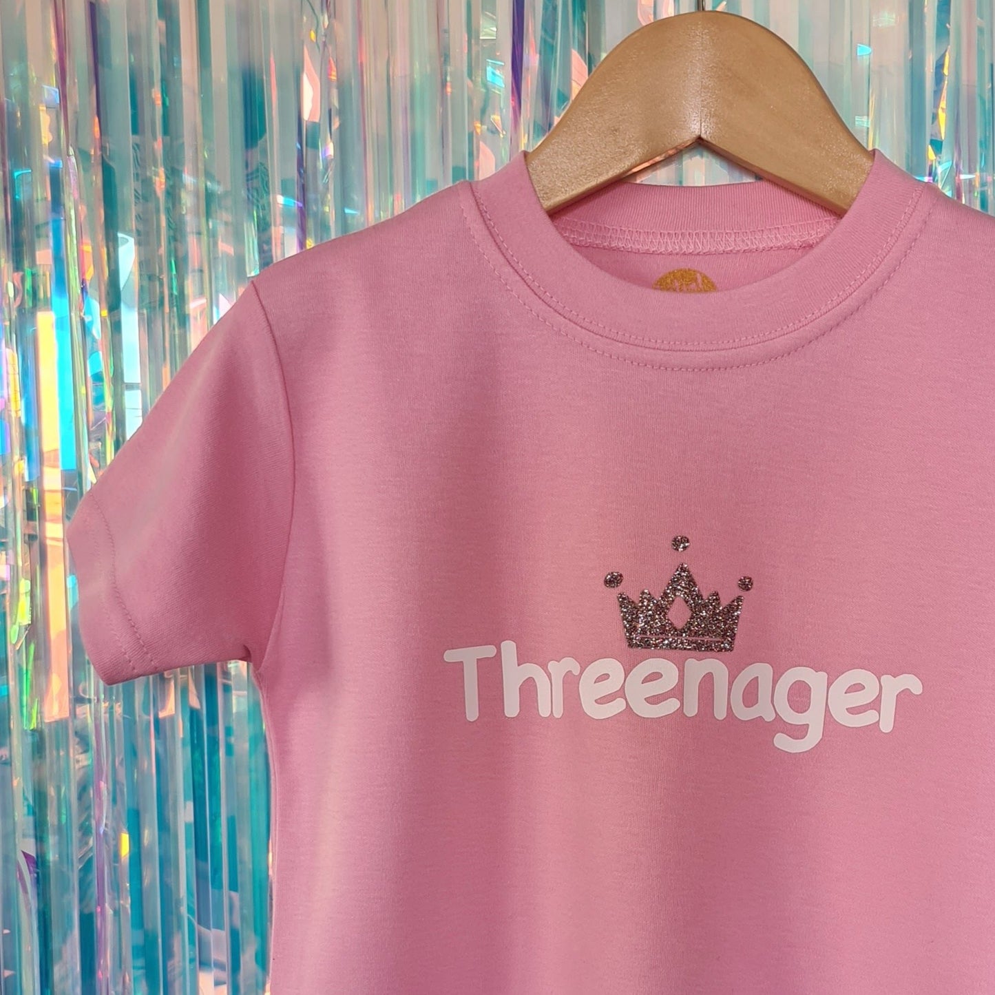 threenager - pale pink tshirt with white text and pink glitter crown