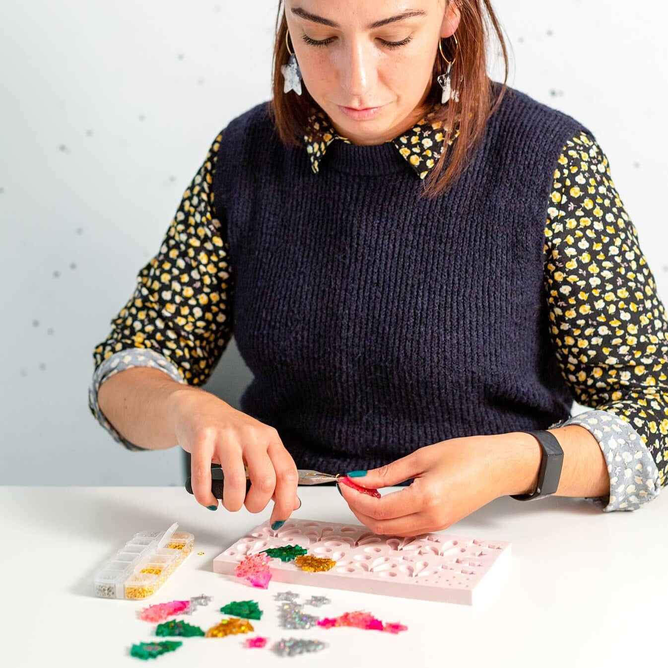 The Joyful Rebel putting together a earrings in her studio in Keynsham, Bristol