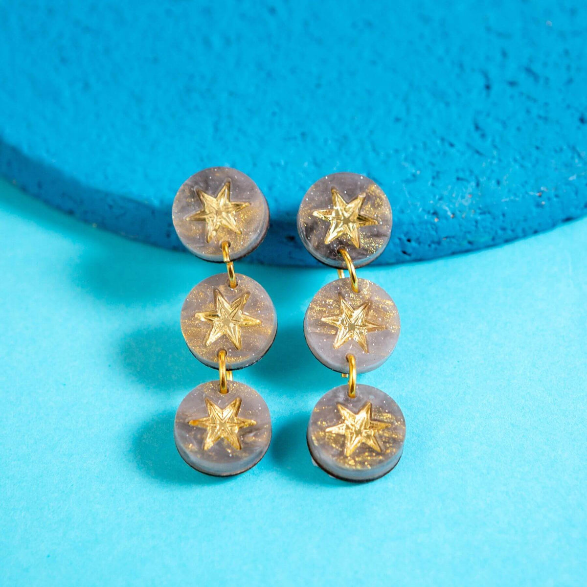 Grey marble constellation triple drop earrings with gold star details