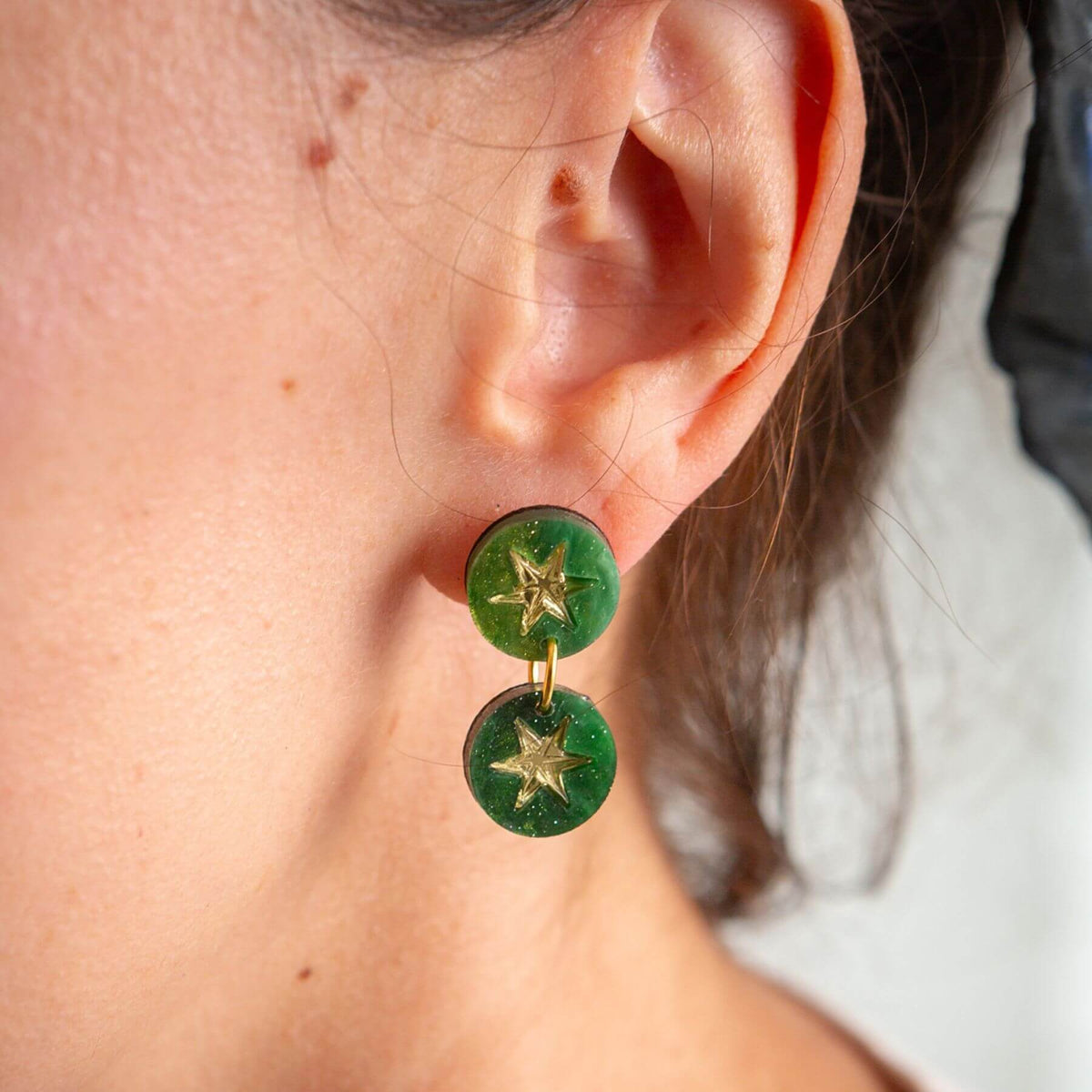 Handmade green marble double drop earrings worn as statement jewellery