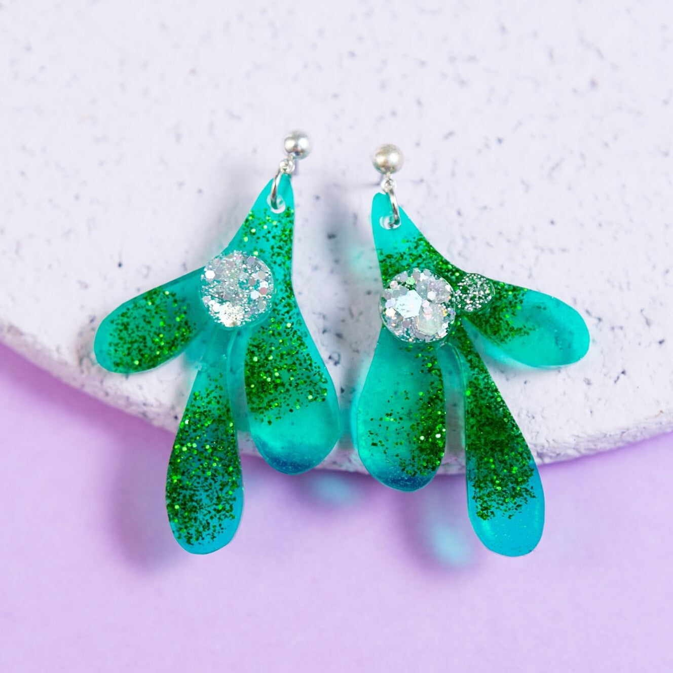 Fun Christmas earrings, sparkly green mistletoes and iridescent silver berries - The Joyful Rebel 