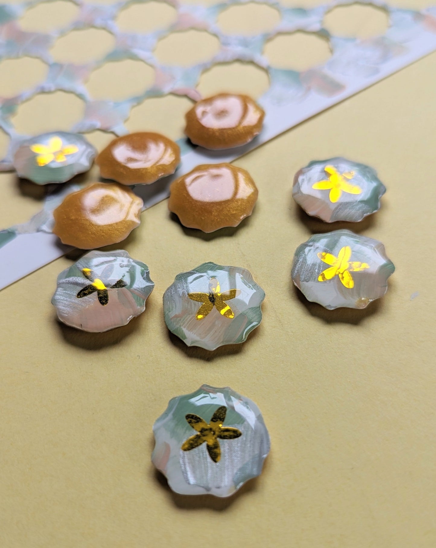 hand painted resin counter, that make up each earrings