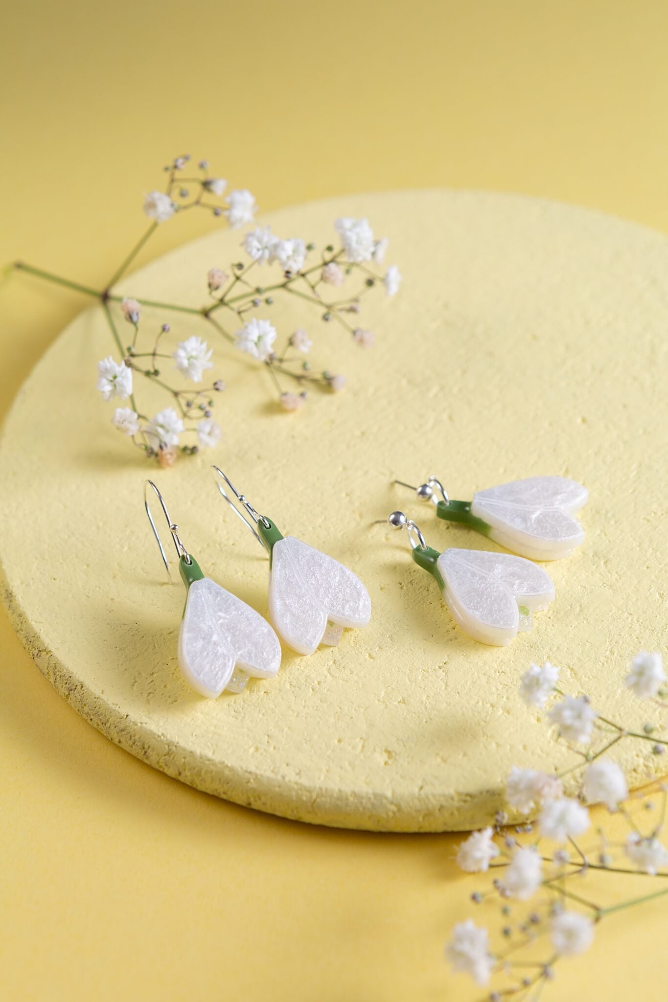 two options of fittings for the snowdrop earring - sterling silver or silver plated studs.