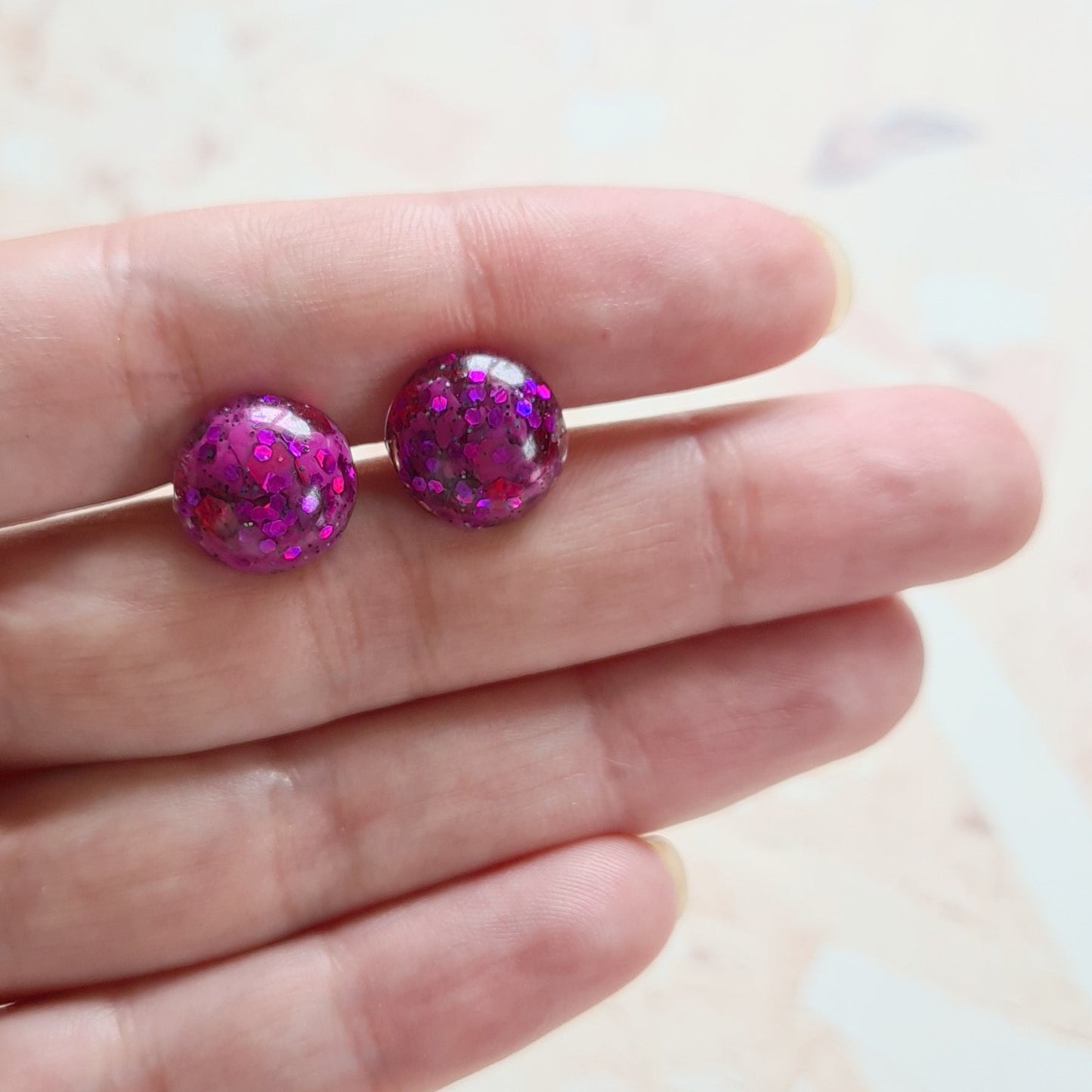 Small glitterball purple stud earrings to add a pop of colour