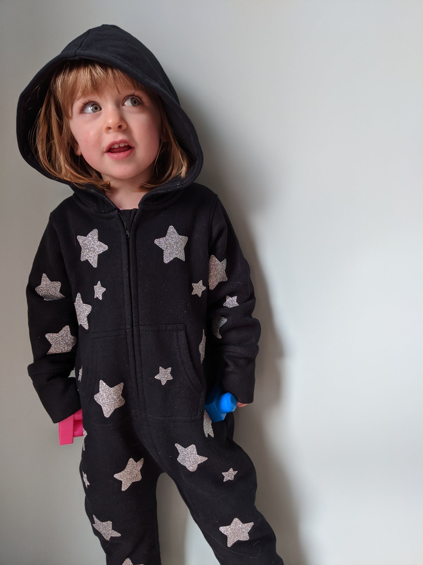 Black fleece onesie with glitter silver stars